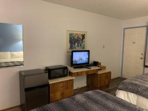 TV o dispositivi per l'intrattenimento presso Swiss Sunset Inn