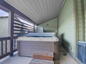 a hot tub on the side of a house at 502 A Gold Coast! townhouse in Park City