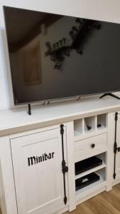 En tv och/eller ett underhållningssystem på Landhaus Dreibirken