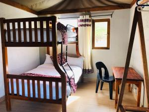 Cama o camas de una habitación en Oldonyo Orok Lodge