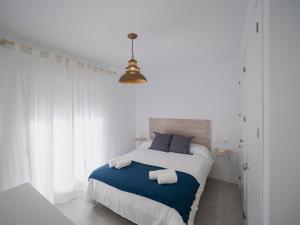 Llit o llits en una habitació de Haus Modern Duque fjHomefj