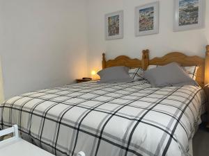 Posteľ alebo postele v izbe v ubytovaní Hervas Centro Apartamento IDEAL FAMILIAS 6 adultos y 2 niños-