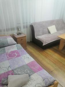 Ein Bett oder Betten in einem Zimmer der Unterkunft Penzion Ivana