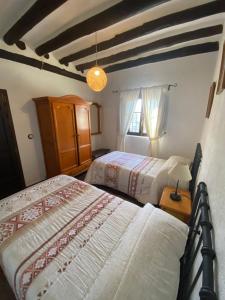 Ένα ή περισσότερα κρεβάτια σε δωμάτιο στο Cortijo La Miel