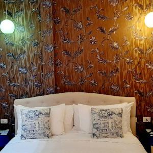 Postel nebo postele na pokoji v ubytování Adamas House Hotel Boutique