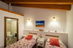 Ein Bett oder Betten in einem Zimmer der Unterkunft Casa Calero
