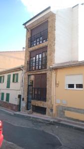 a building on the side of a street at Mini Loft in Becerril de la Sierra