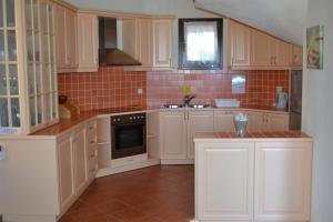 A kitchen or kitchenette at Danai villa