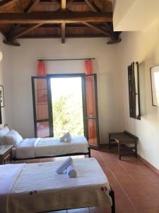 A bed or beds in a room at Danai villa