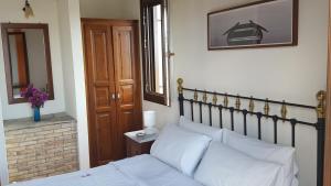 A bed or beds in a room at Danai villa