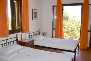 A bed or beds in a room at Danai villa