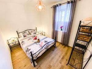 Ένα ή περισσότερα κρεβάτια σε δωμάτιο στο Casa da Avó