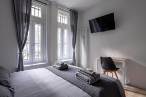 A bed or beds in a room at [FIERA MILANO-CITY LIFE] ☆☆☆☆☆ Tre Torri House