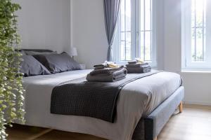 A bed or beds in a room at [FIERA MILANO-CITY LIFE] ☆☆☆☆☆ Tre Torri House