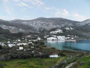 a view of a town and a body of water at Amorgi Studios in Aegiali