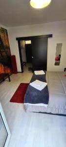 A bed or beds in a room at Virginia House 2