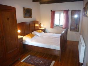 Un pat sau paturi într-o cameră la Penzion Olšina 31