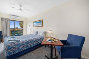 Postel nebo postele na pokoji v ubytování Navigators Motel