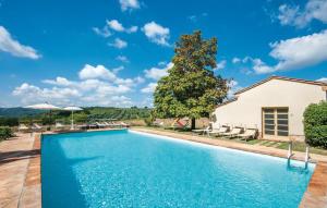 Bazén v ubytovaní Agriturismo Fattoria Il Piano - Appartamento Aia - San Gimignano alebo v jeho blízkosti + 20 fotografií