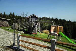 a park with a playground with a swing at Panoramic view holiday home, Neureichenau in Neureichenau