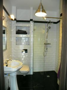 Kúpeľňa v ubytovaní Apartament