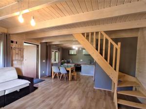 a room with a staircase in a tiny house at La Paloma - Lux Houses in Kolczewo in Kołczewo