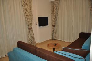 Area tempat duduk di Almera Park Apart Hotel