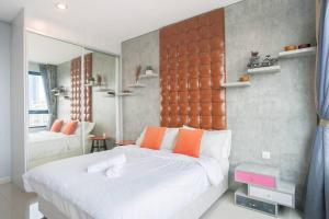 a bedroom with a large bed and a mirror at iCity 1Bedroom Apt Near Mall FREE PARKING & WIFI in Shah Alam +19 photos