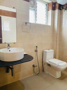 Koupelna v ubytování Hotel Saayein Residency