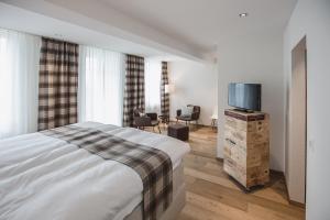 Postel nebo postele na pokoji v ubytování Boutique Hotel Moosegg