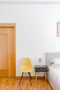 A bed or beds in a room at Elegant Apartment Via Veneto by Varental