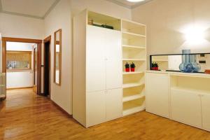 A kitchen or kitchenette at Elegant Apartment Via Veneto by Varental