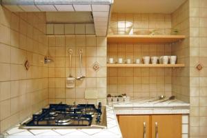 A kitchen or kitchenette at Elegant Apartment Via Veneto by Varental