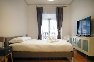 A bed or beds in a room at Elegant Apartment Via Veneto by Varental