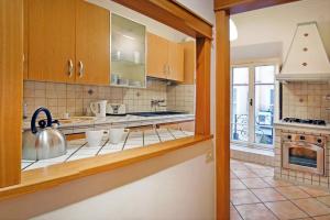 A kitchen or kitchenette at Elegant Apartment Via Veneto by Varental