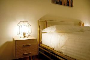 A bed or beds in a room at Elegant Apartment Via Veneto by Varental