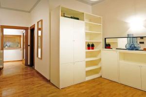 A kitchen or kitchenette at Elegant Apartment Via Veneto by Varental