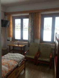 Posteľ alebo postele v izbe v ubytovaní Villa jumper widok na całe Tatry łazienka nie jest w pokoju i jest wspólna z innymi ludźmi