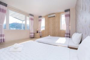 Giường trong phòng chung tại Hai Yen Villa 1