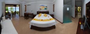 Postel nebo postele na pokoji v ubytování Anse Soleil Beachcomber Hotel and Self Catering