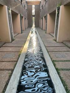 a canal of water in an empty building at Ten On Lane in Polokwane