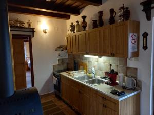 Kuchyň nebo kuchyňský kout v ubytování Black Sheep Apartmant
