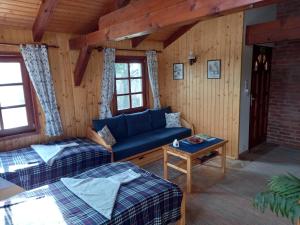 Postel nebo postele na pokoji v ubytování Black Sheep Apartmant