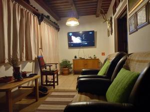 Posezení v ubytování Black Sheep Apartmant