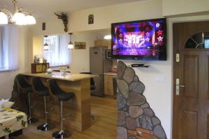 A television and/or entertainment center at Holiday flats, Ostaszewo