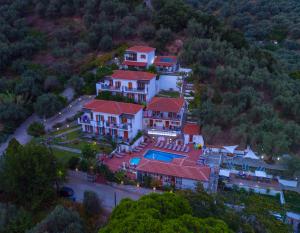 an aerial view of a large house with red roofs at SKIATHOS-FILOKALIA in Achladies