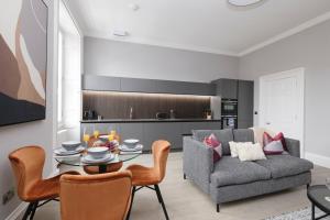 Et opholdsområde på JOIVY Luxurious Apt on Notable George Street + 35 billeder