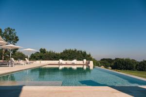 Der Swimmingpool an oder in der Nähe von HelloAPULIA - Masseria Minetta - Infinity Saltwater Pool & Scenic View