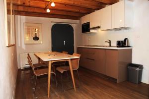 Kuchyň nebo kuchyňský kout v ubytování Boutique Hotel Dvor