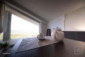 Postel nebo postele na pokoji v ubytování L'oro dei fiori (Honey spa)